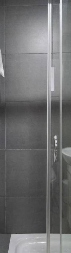 a bathroom with a shower and a sink at Heart Of Nicosia - The Gem in Nicosia