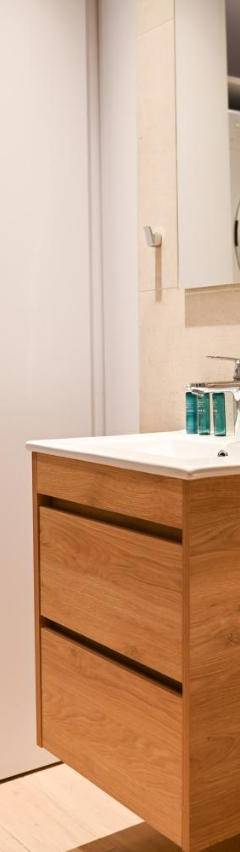 a bathroom with a washing machine and a washer and dryer at The 1 -Nicosia Elite Stay- Gym Pool 24h Concierge in Nicosia