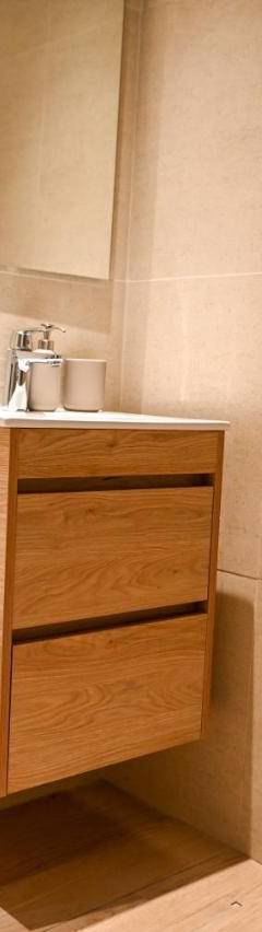 a small bathroom with a toilet and a sink at The 1 -Nicosia Elite Stay- Gym Pool 24h Concierge in Nicosia