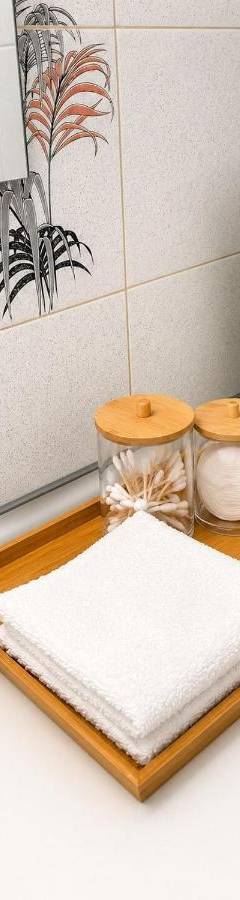 a tray with towels and toilet paper on a bathroom counter at Theo 302 - Comfort 2 Queen Bdr Nicosia with Parking in Nicosia