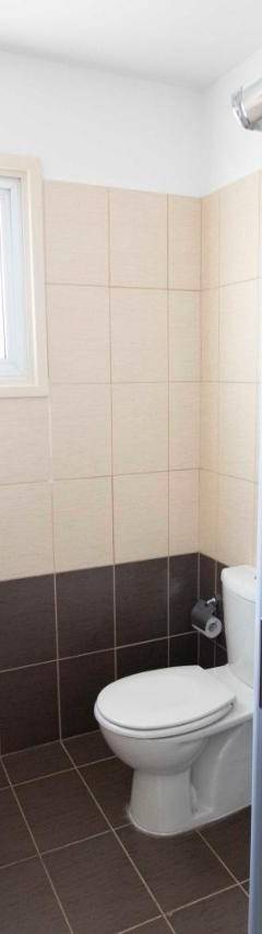 a bathroom with a toilet and a sink and a shower at Glabur Stays - The Sunny Atelier - Nicosia City, Free Parking &amp; Wifi, Welcomes You!!! in Nicosia