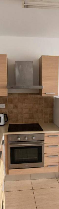 a kitchen with a microwave and a refrigerator at Glabur Stays - The Master Atelier - Nicosia City, Free Parking &amp; Wifi, Welcomes You!!! in Nicosia