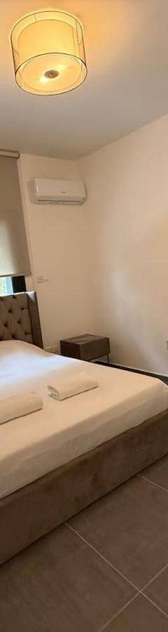 a bedroom with a large bed in a room at Glabur Stays - Nicosia Elite 2BDR in Nicosia