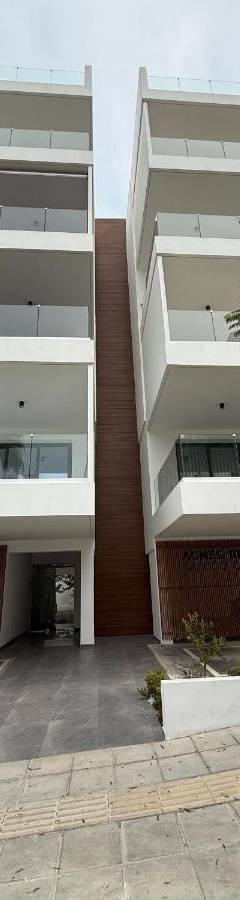 a white car parked in front of a building at Glabur Stays - Nicosia Elite 2BDR in Nicosia