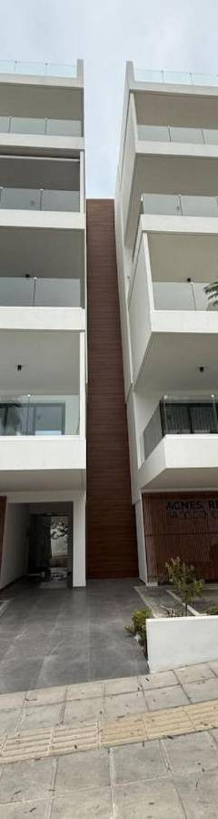 a white car parked in front of a building at Glabur Stays - Nicosia Elite 2BDR in Nicosia