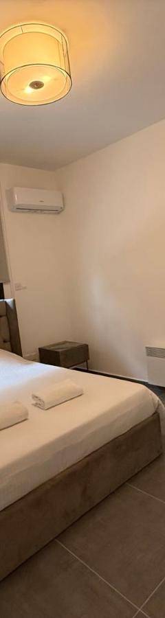 a bedroom with a large bed in a room at Glabur Stays - Nicosia Elite 2BDR in Nicosia