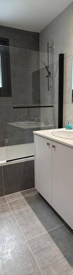 a bathroom with a toilet and a sink and a tub at Glabur Stays - Nicosia Elite 2BDR in Nicosia
