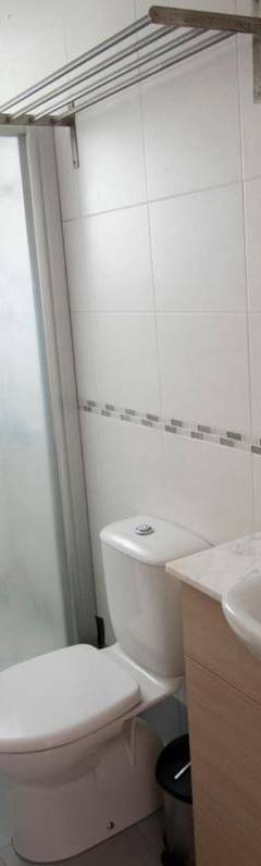 a bathroom with a toilet and a sink and a shower at Glabur Stays - The Nicosia Elite - Exceptional Top Floor Apartment Nicosia City, Welcomes U!!! in Nicosia
