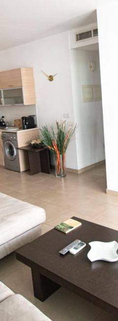 a living room with a couch and a table at Glabur Stays - The Nicosia Elite - Exceptional Top Floor Apartment Nicosia City, Welcomes U!!! in Nicosia