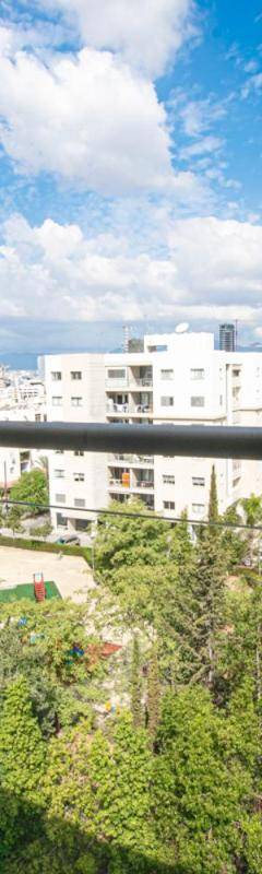 a view of a city from the balcony of a building at Glabur Stays - The Nicosia Elite - Exceptional Top Floor Apartment Nicosia City, Welcomes U!!! in Nicosia
