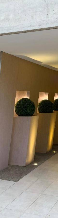 a lobby of a building with a sign on the wall at Glabur Stays - The Nicosia Elite - Exceptional Top Floor Apartment Nicosia City, Welcomes U!!! in Nicosia