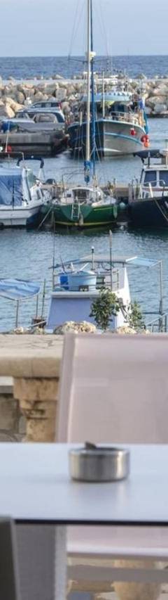 a view of a marina with boats in the water at Glabur Stays! The One -1 - Elite Marina Front! in Zygi