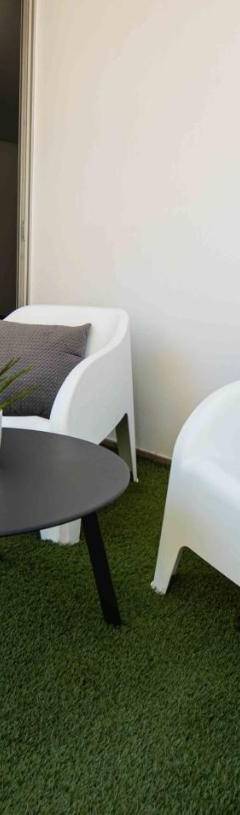 a living room with two chairs and a table and a couch at Glabur Stays - The Amazing 1 BDR - Executive apt Nicosia Center Free Parking &amp; WiFi in Nicosia
