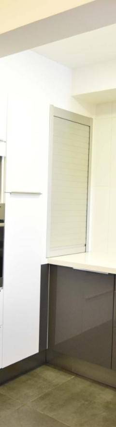 a kitchen with stainless steel appliances and white cabinets at Glabur Stays - The Amazing 1 BDR - Executive apt Nicosia Center Free Parking &amp; WiFi in Nicosia