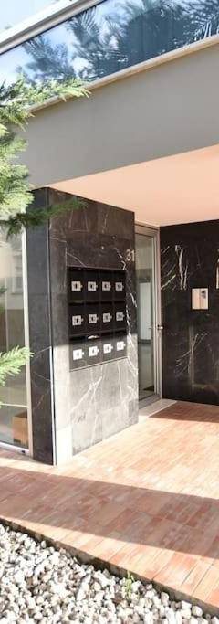 an internal view of a house with a stone wall at Glabur Stays - The Amazing 1 BDR - Executive apt Nicosia Center Free Parking &amp; WiFi in Nicosia