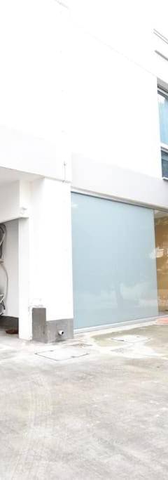 a large white building with a tree in front of it at Glabur Stays - The Amazing 1 BDR - Executive apt Nicosia Center Free Parking &amp; WiFi in Nicosia
