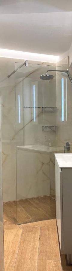 a bathroom with a shower and a sink at Sweet Luxury 2BR Nicosia City in Nicosia