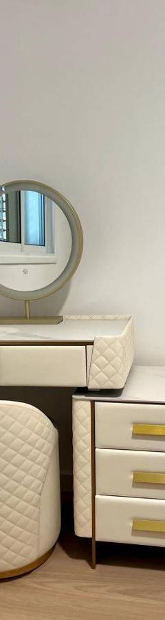 a dressing table with a mirror and a chair at Sweet Luxury 2BR Nicosia City in Nicosia
