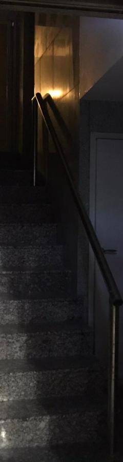 a stairway leading up to a door in a building at Alex Beach Apartment 34 in Larnaka