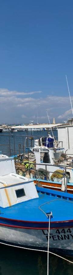 a group of boats are docked in the water at Ithaki Phinikoudes Apartment No. 107 in Larnaka