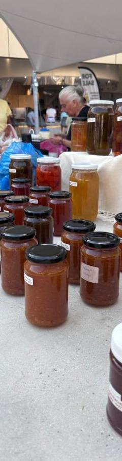 a group of jars of honey sitting on a table at Raam Luxury Suites in Larnaka